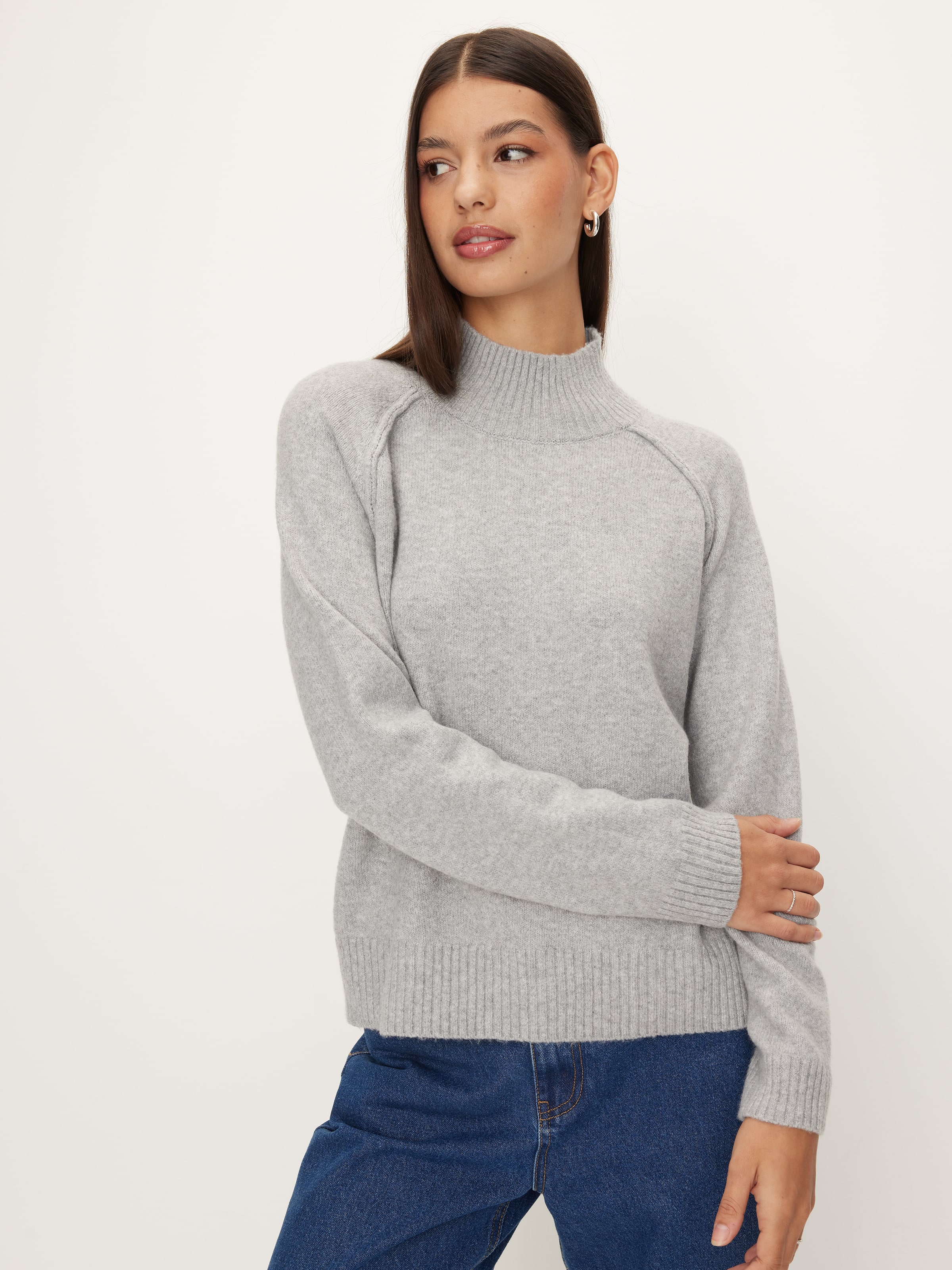 Exposed Seam Funnel Neck Knit