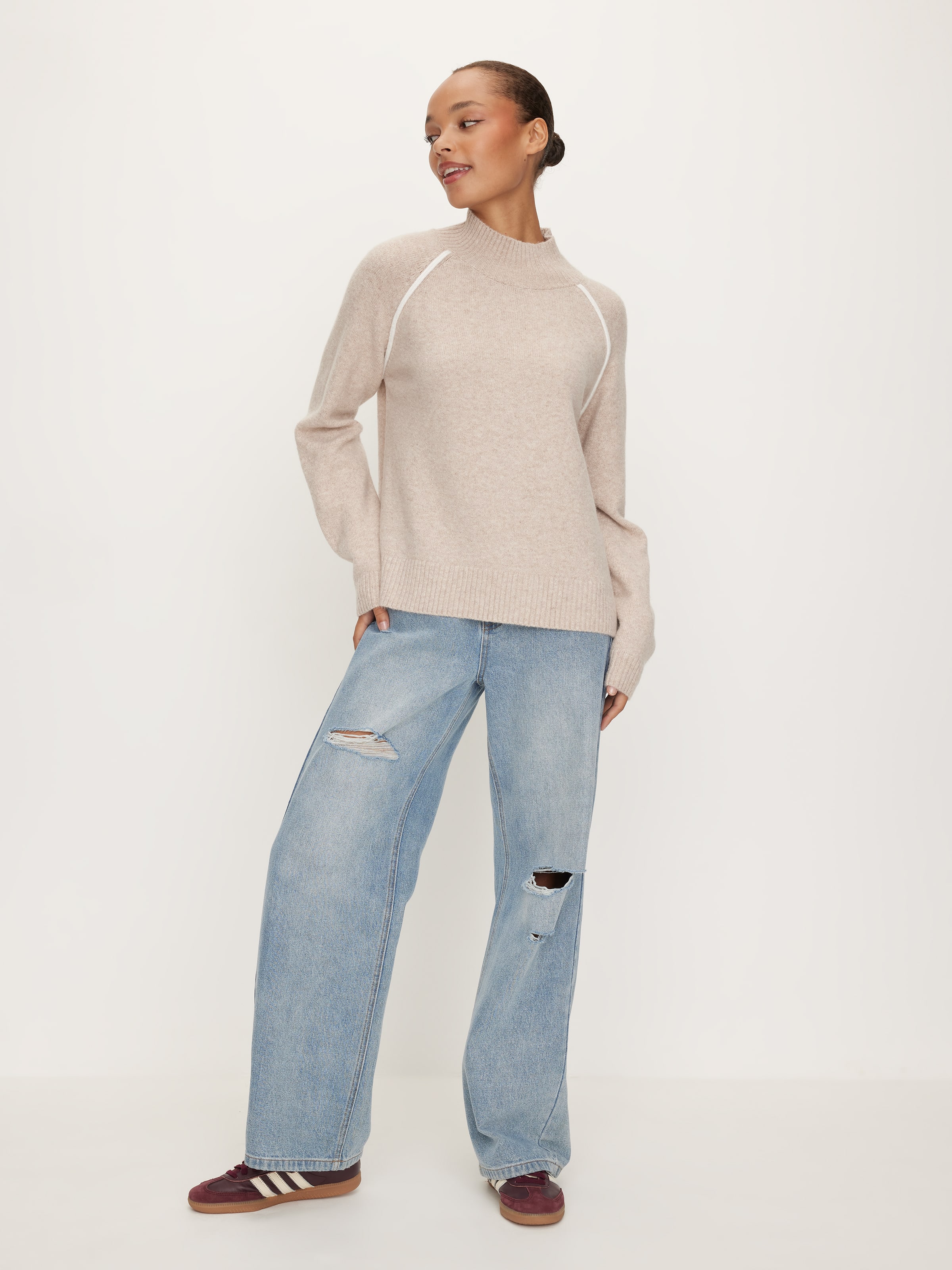 Exposed Seam Funnel Neck Knit